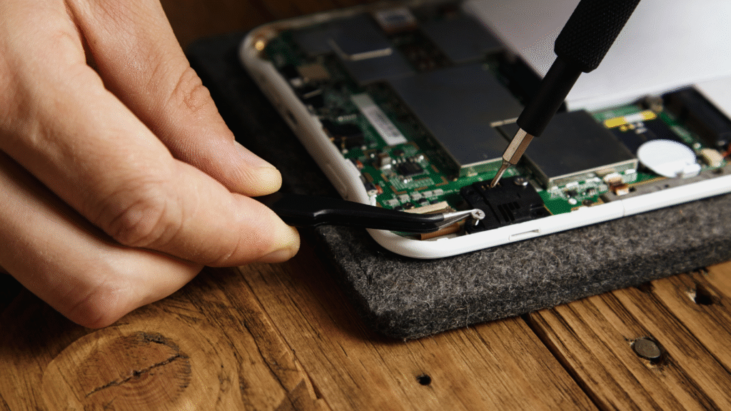 Mobile phone repair service fixing internal components