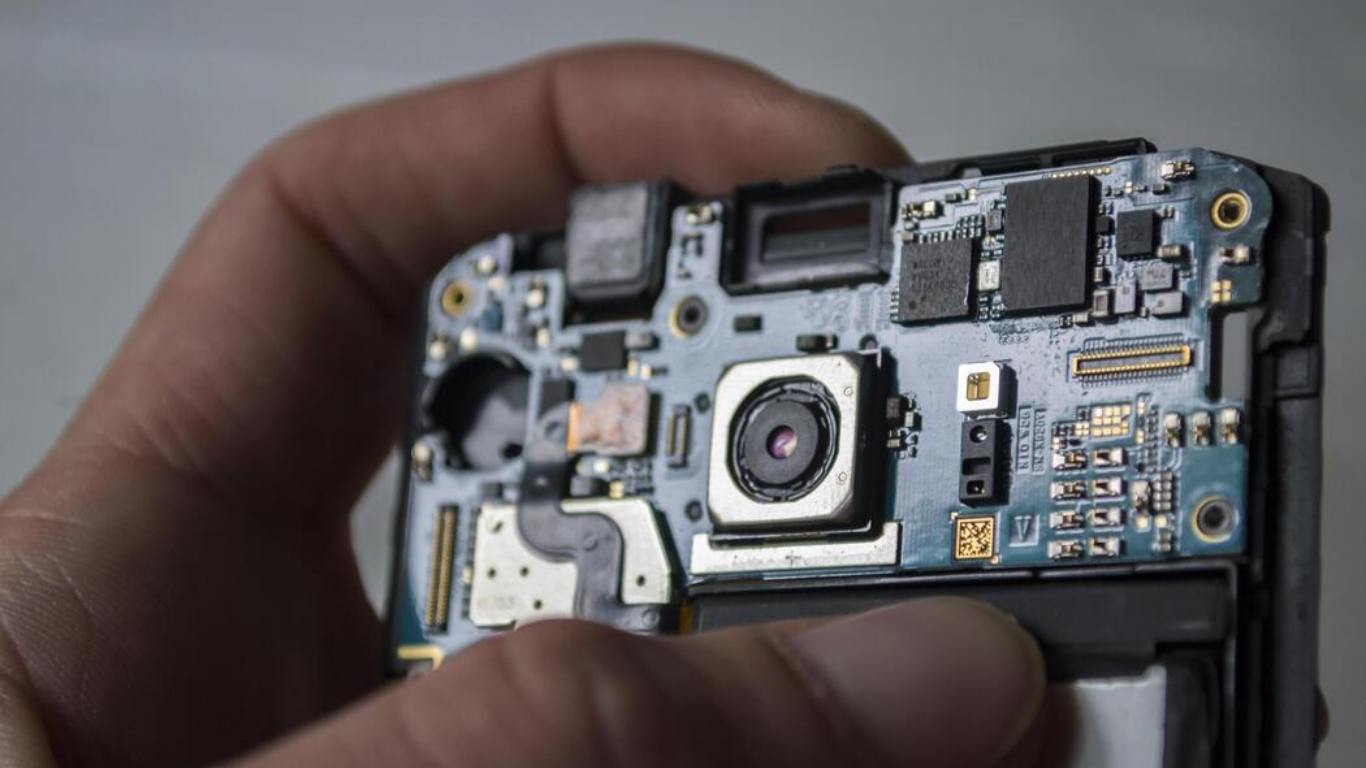 Broken camera being repaired by expert