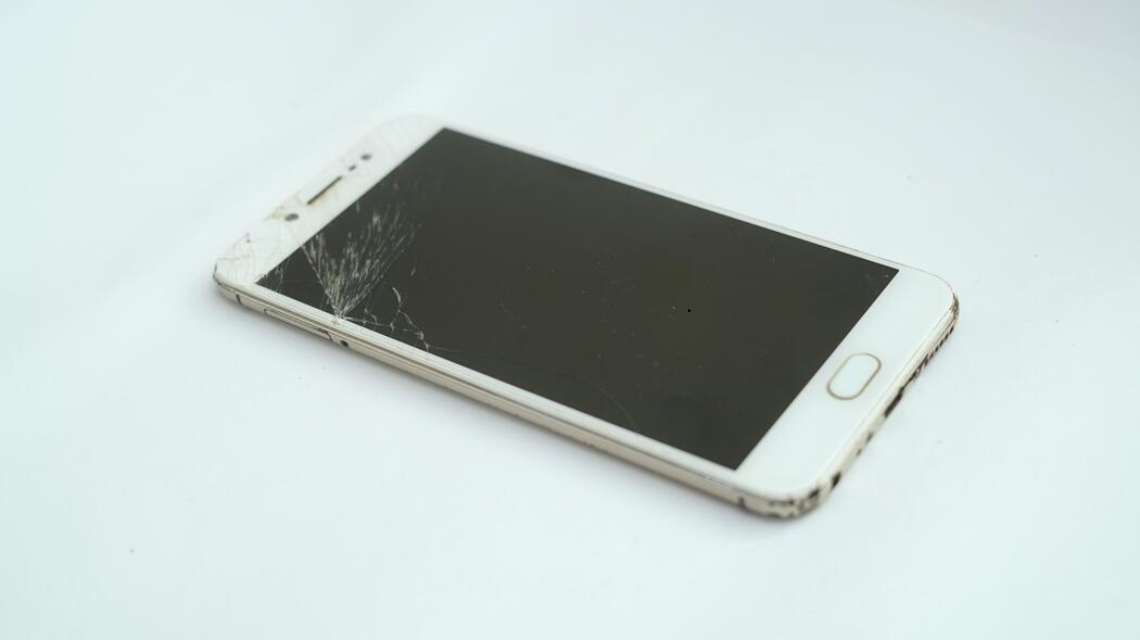 Cracked phone screen before repair service